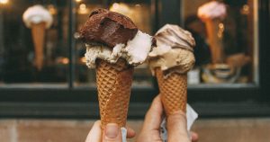 A pair of ice cream cones with vanilla and chocolate ice cream from a local ice creamery in Sheboygan, WI