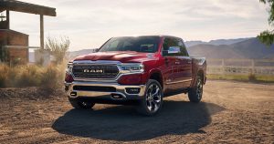 A red RAM 1500 pickup truck parked on a ranch near Sheboygan, WI